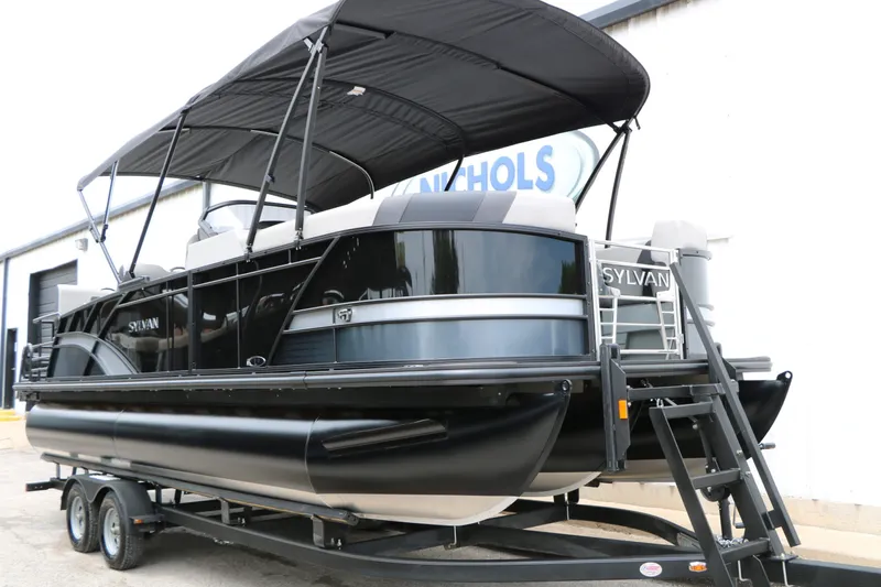Slide: The Image of 2026 Sylvan L3 RLZ Tri Toon pontoon boat on trailer. - 5