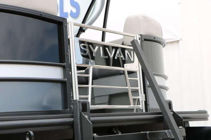 Slide: The Image of Sylvan L3 RLZ Tri Toon 2026 boat with metal railing. - 6
