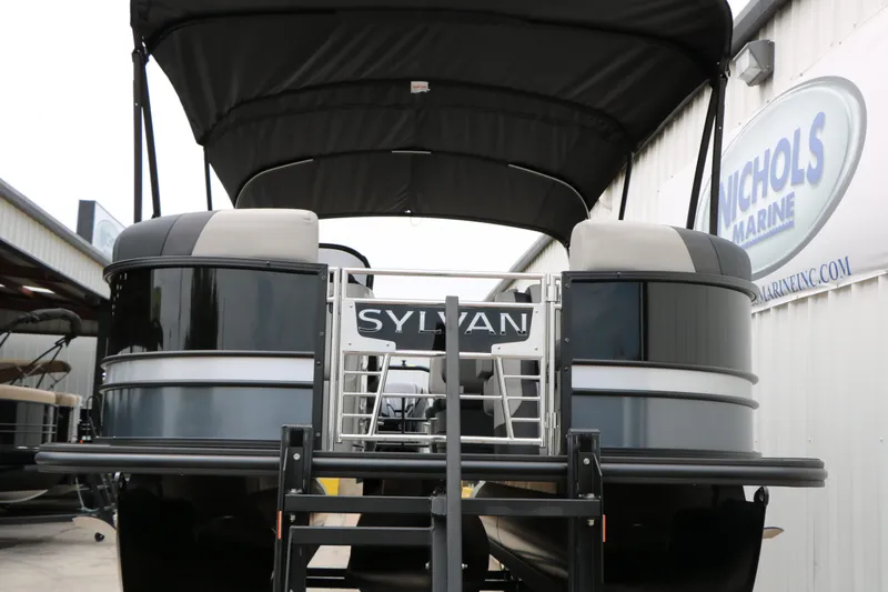 Slide: The Image of 2026 Sylvan L3 RLZ Tri Toon pontoon boat at dock. - 8