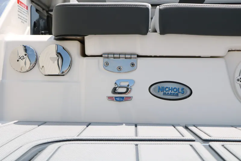 Slide: The Image of 2026 Chaparral SSX 8 boat rear with brand logos. - 15