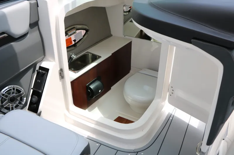 Slide: The Image of Interior of 2026 Chaparral SSX 8 with toilet and sink. - 43