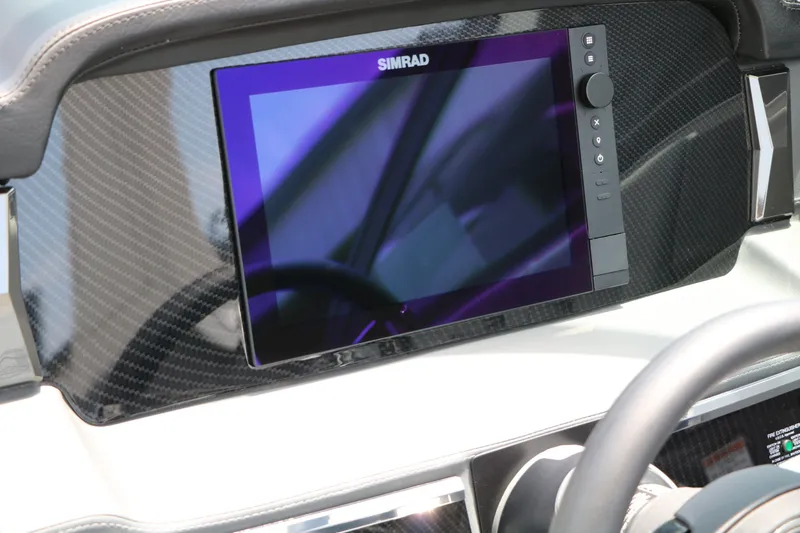 Slide: The Image of 2026 Chaparral SSX 8 dashboard featuring Simrad display. - 46