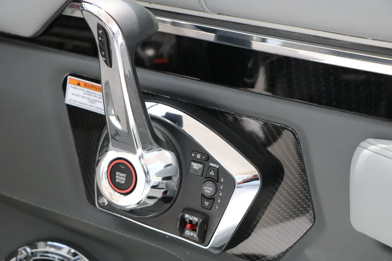Slide: The Image of 2026 Chaparral SSX 8 boat control with start-stop button. - 49