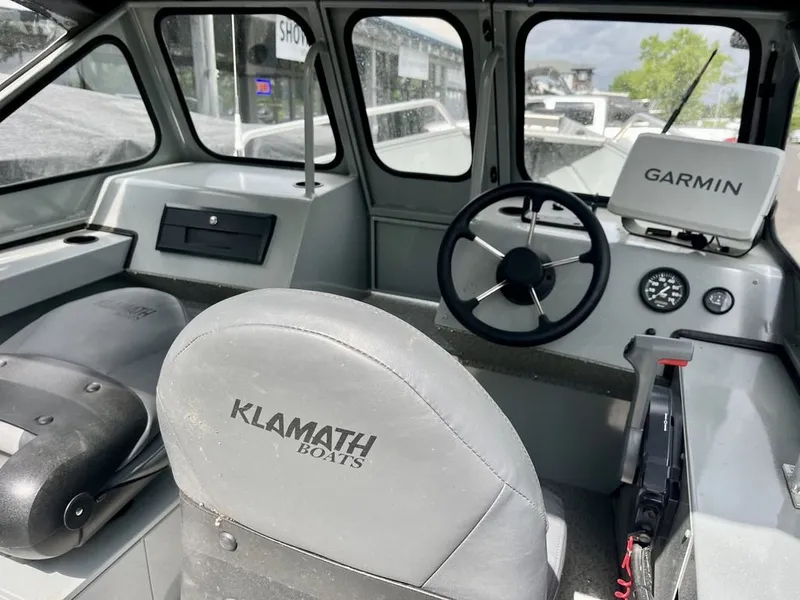 Slide: The Image of Interior of 2024 Klamath 18 OPW boat with Garmin navigation. - 5