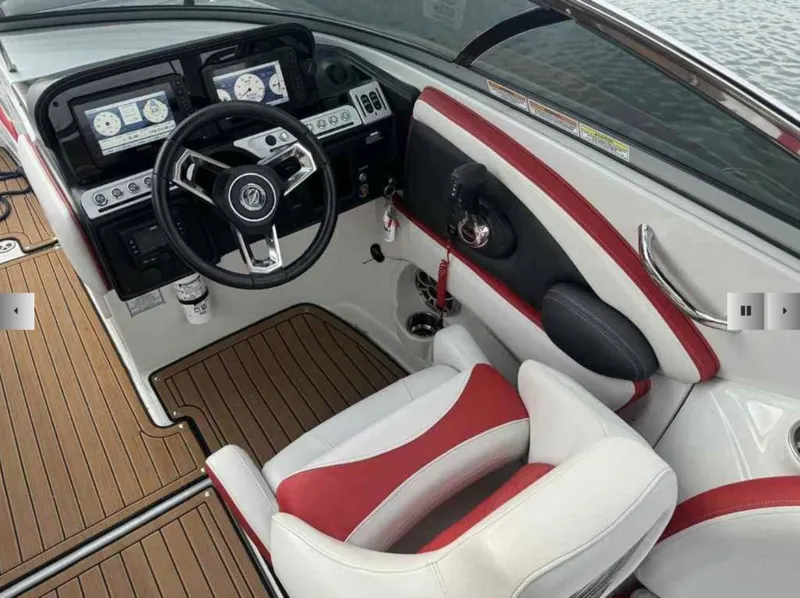 Slide: The Image of Interior of 2023 Crownline 280 SS with modern dashboard. - 10