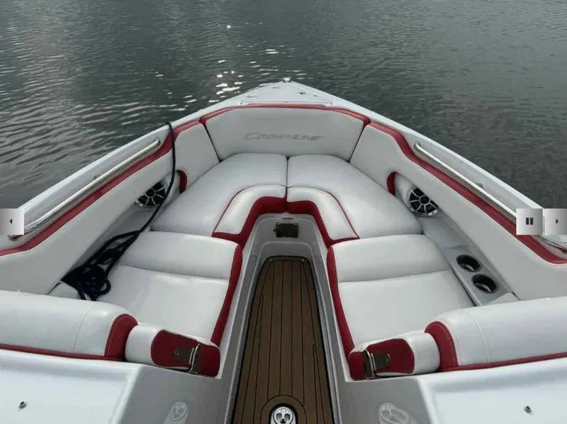 Slide: The Image of Interior of 2023 Crownline 280 SS boat with white and red seating. - 12