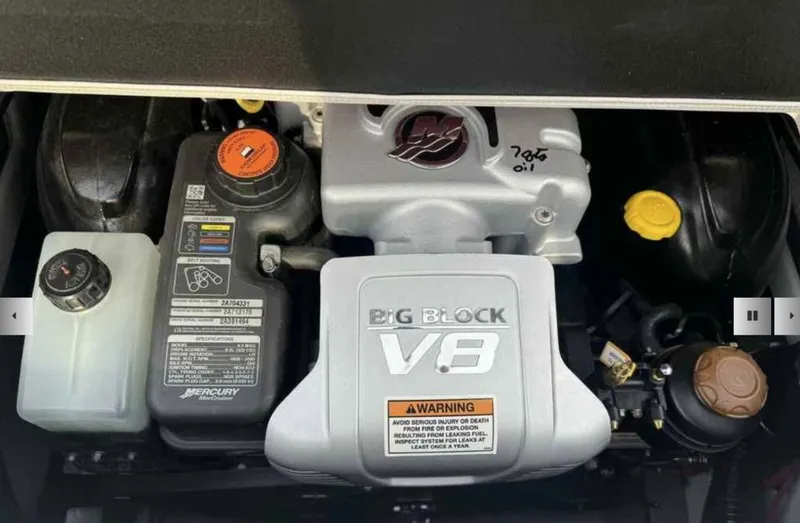 Slide: The Image of Crownline 280 SS 2023 engine bay featuring Big Block V8 engine. - 14