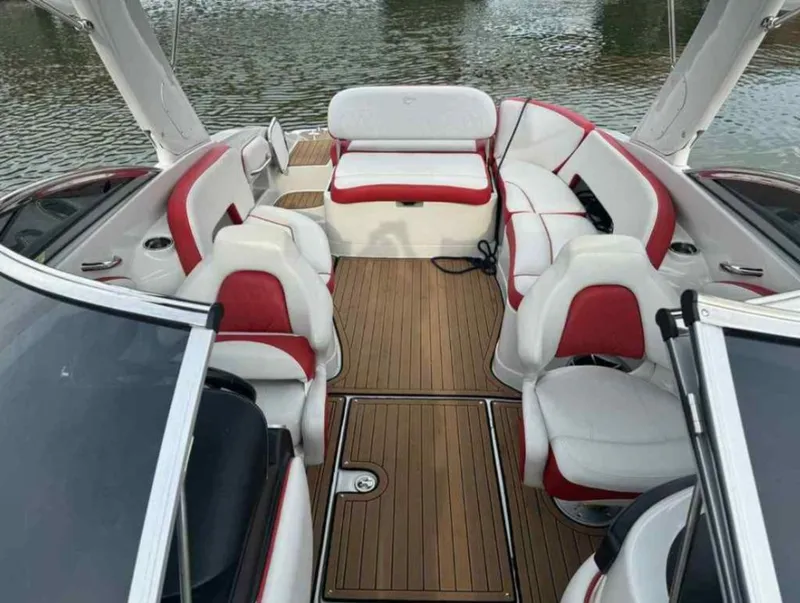 Slide: The Image of Interior of 2023 Crownline 280 SS with red and white seating. - 3