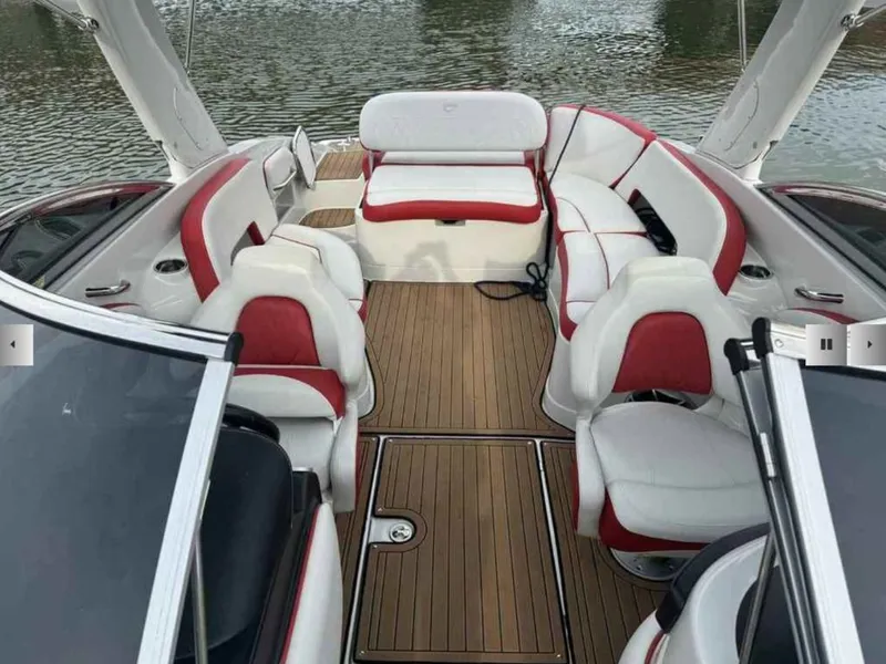 Slide: The Image of Interior of 2023 Crownline 280 SS with red and white seating. - 6
