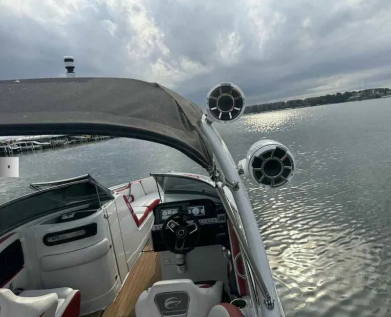 Slide: The Image of Interior view of 2023 Crownline 280 SS yacht on calm water. - 8