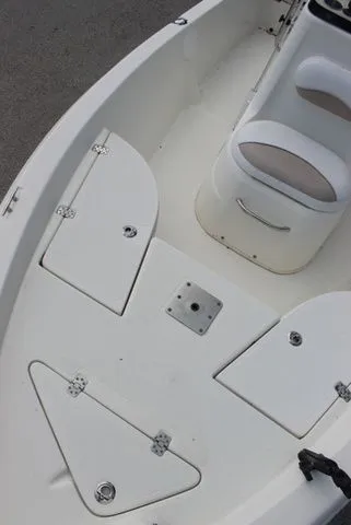 Slide: The Image of Interior view of a 2016 NauticStar 1810 boat with seating and storage. - 10