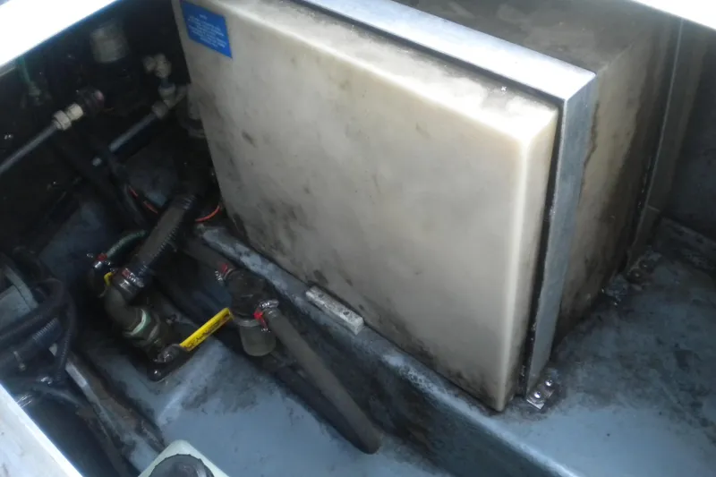 Slide: The Image of Engine compartment of a 1996 Sea Ray 270 Sundancer boat, showing mechanical components. - 20