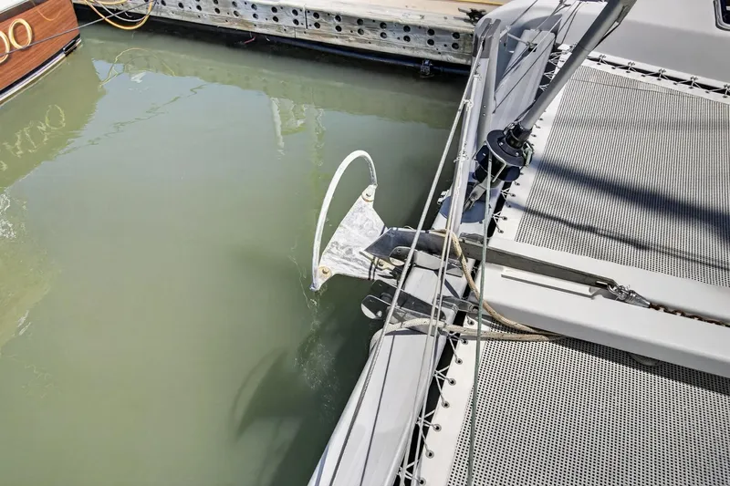 Slide: The Image of 2018 Lagoon 42 catamaran anchor and deck detail at marina. - 10