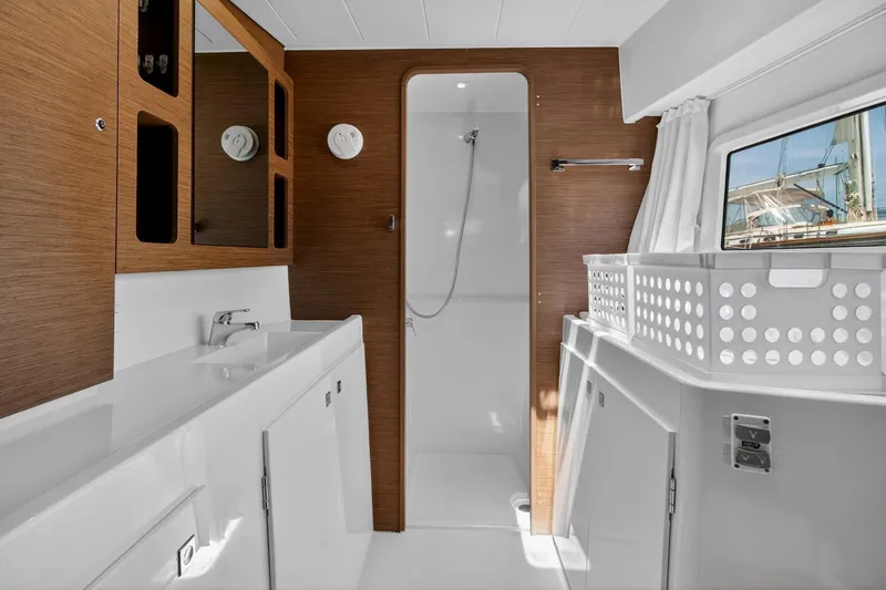 Slide: The Image of Modern bathroom interior of 2018 Lagoon 42 yacht with shower and sink. - 44