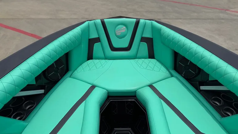 Slide: The Image of Interior of 2022 Tigé 23ZX with turquoise upholstery. - 13