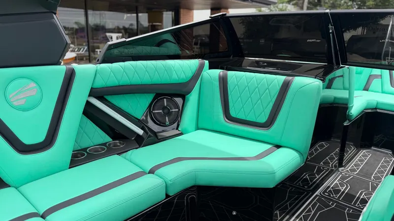 Slide: The Image of Interior of 2022 Tigé 23ZX with turquoise seating. - 16