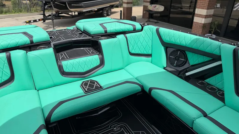 Slide: The Image of Interior of 2022 Tigé 23ZX with turquoise upholstery. - 17