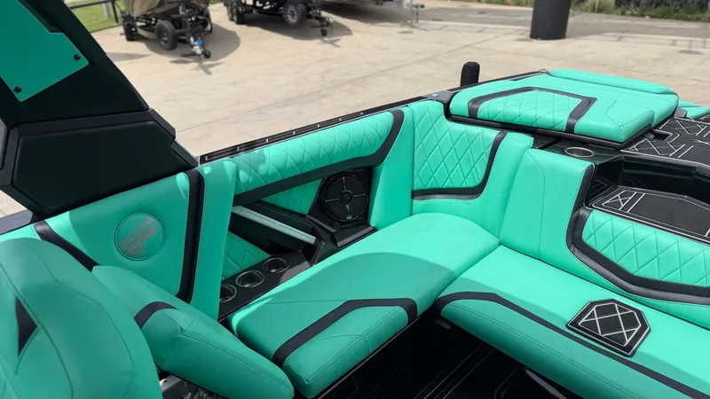 Slide: The Image of Interior of 2022 Tigé 23ZX with turquoise upholstery. - 18