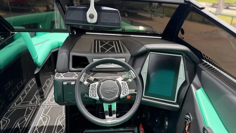 Slide: The Image of Interior of 2022 Tigé 23ZX boat with modern dashboard. - 20