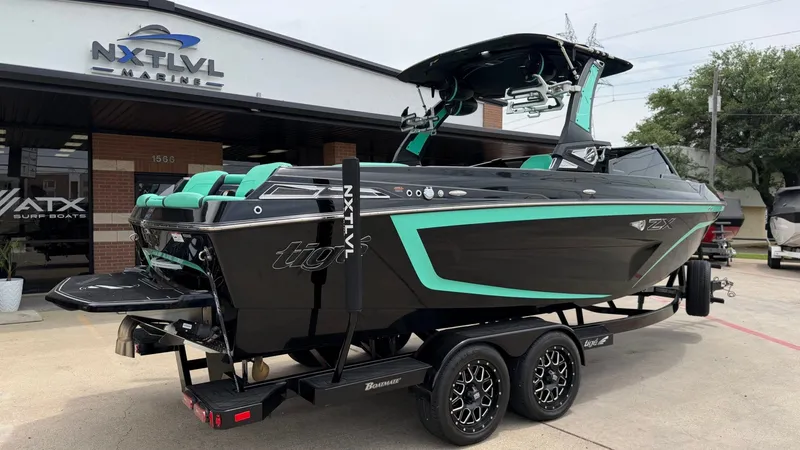 Slide: The Image of 2022 Tigé 23ZX boat at NXT LVL Marine. - 3