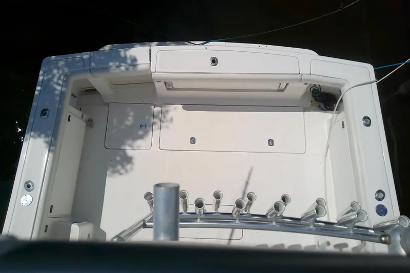 Slide: The Image of Overhead view of 2000 Tiara Yachts 4100 Open deck, featuring rod holders and storage compartments. - 22