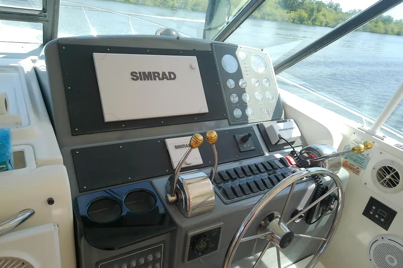 Slide: The Image of Helm of 2000 Tiara Yachts 4100 Open with Simrad navigation system. - 36