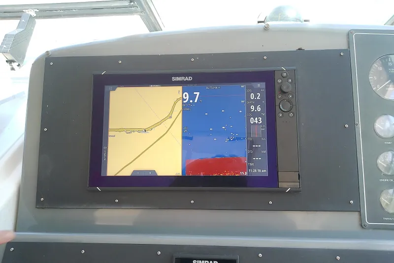Slide: The Image of Simrad navigation display on 2000 Tiara Yachts 4100 Open, showing map and data. - 39