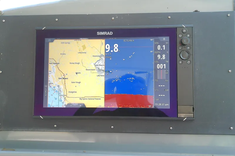 Slide: The Image of Simrad navigation display on 2000 Tiara Yachts 4100 Open, showing map and sonar data. - 40