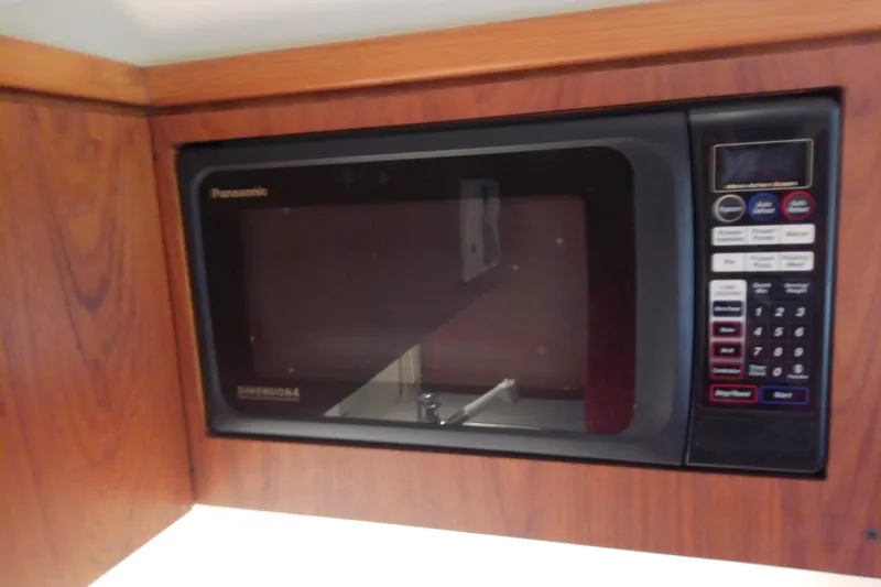 Slide: The Image of Built-in Panasonic microwave in 2000 Tiara Yachts 4100 Open kitchen. - 55