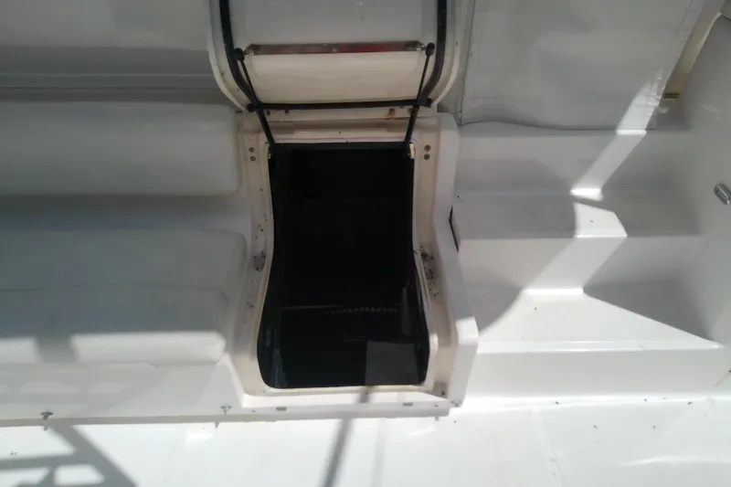Slide: The Image of Open hatch on 2000 Tiara Yachts 4100 Open, revealing interior access. - 71
