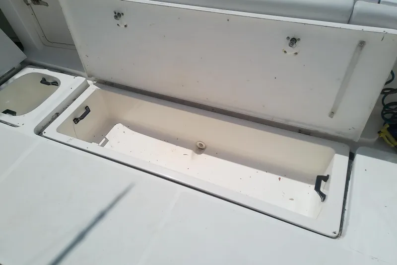 Slide: The Image of Open storage compartment on a 2000 Tiara Yachts 4100 Open boat deck. - 84