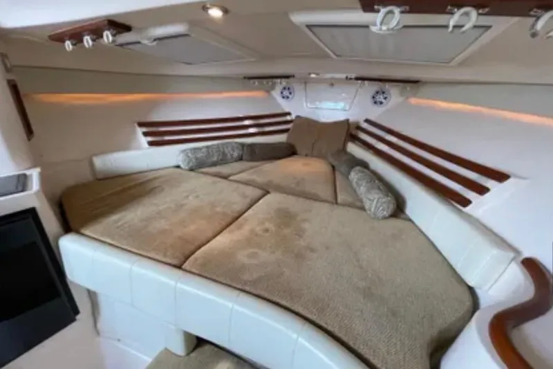 Slide: The Image of Interior cabin of 2007 Grady-White Express 330 with cozy seating and cushions. - 33