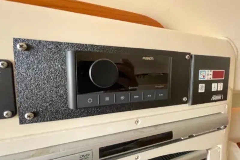 Slide: The Image of Audio control panel on a 2007 Grady-White Express 330 boat. - 44