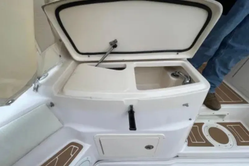 Slide: The Image of Open storage compartment on a 2007 Grady-White Express 330 boat. - 51