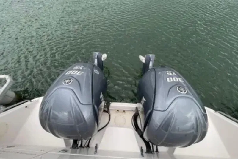 Slide: The Image of Twin Yamaha 300 outboard engines on a 2007 Grady-White Express 330 boat. - 59