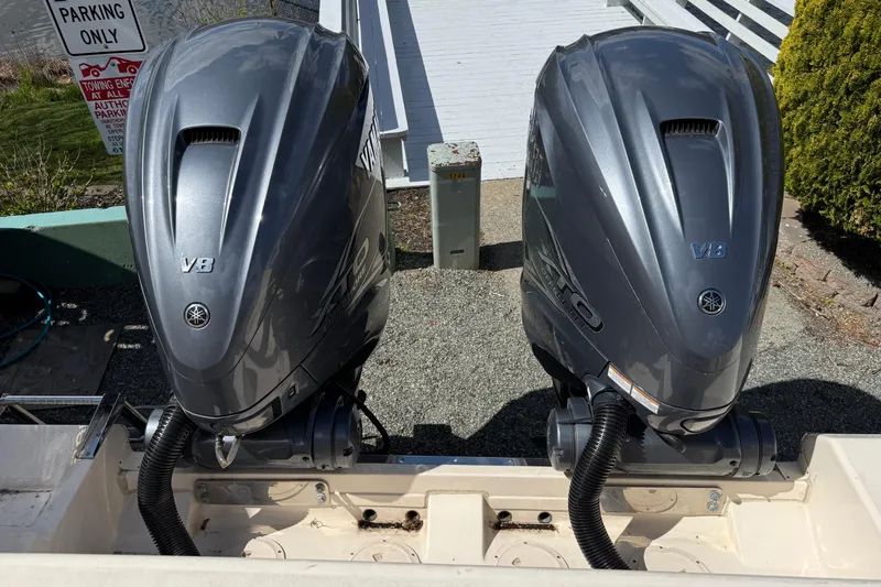 Slide: The Image of Twin Yamaha V8 outboard engines on a 2021 Grady-White Express 330 boat. - 16