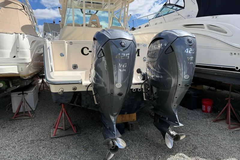 Slide: The Image of 2021 Grady-White Express 330 with twin Yamaha 425 V8 outboard engines on display. - 5