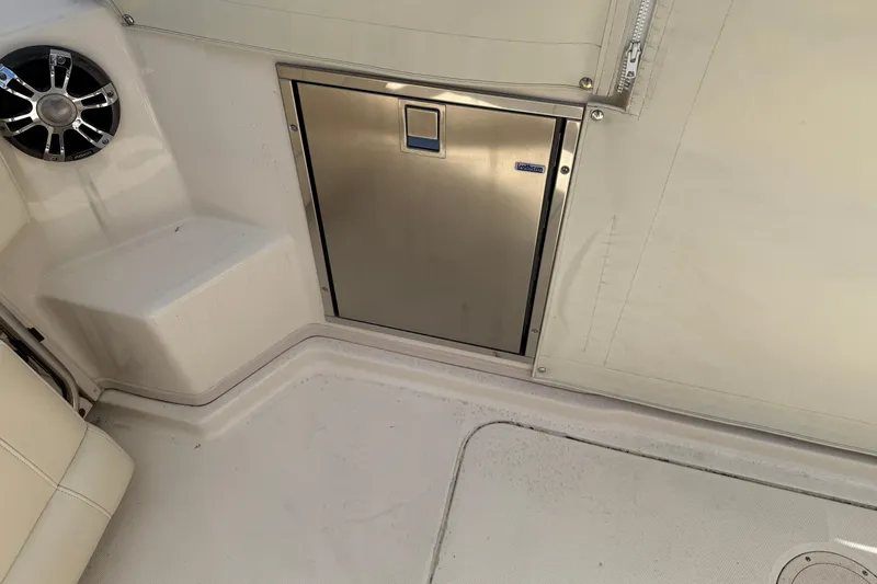 Slide: The Image of 2021 Grady-White Express 330 boat interior with stainless steel storage compartment. - 8