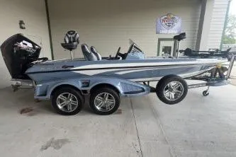 Slide: The Image of 2026 Ranger Z519R Cup-Equipped boat in a garage, showcasing sleek design and modern features. - 2
