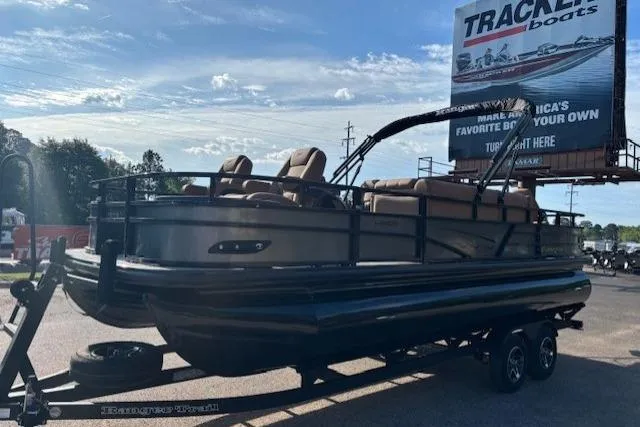 The Image of 2026 Ranger 220F pontoon boat on trailer, displayed outdoors under a clear sky. - 0