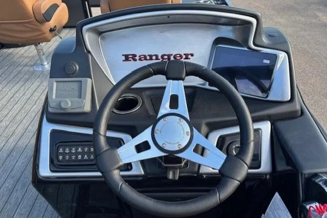 Slide: The Image of Steering console of 2026 Ranger 220F boat with modern controls and display. - 19