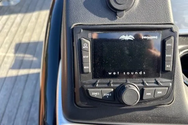 Slide: The Image of Control panel of a 2026 Ranger 220F boat featuring a Wet Sounds audio system. - 22