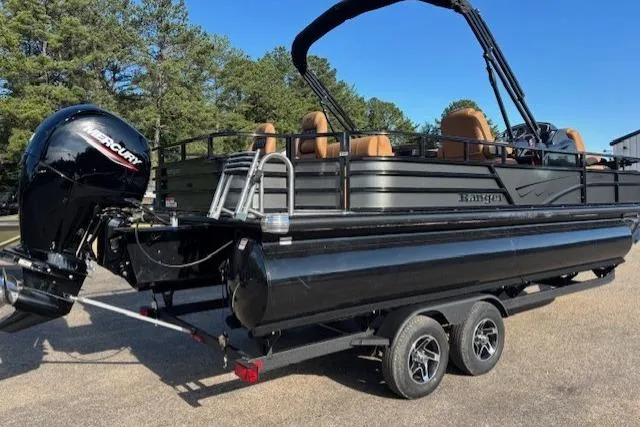 Slide: The Image of 2026 Ranger 220F pontoon boat with Mercury outboard engine on trailer. - 4