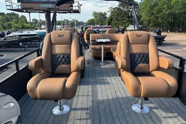 Slide: The Image of Luxurious 2026 Ranger 220F boat interior with plush tan seating and sleek design. - 8