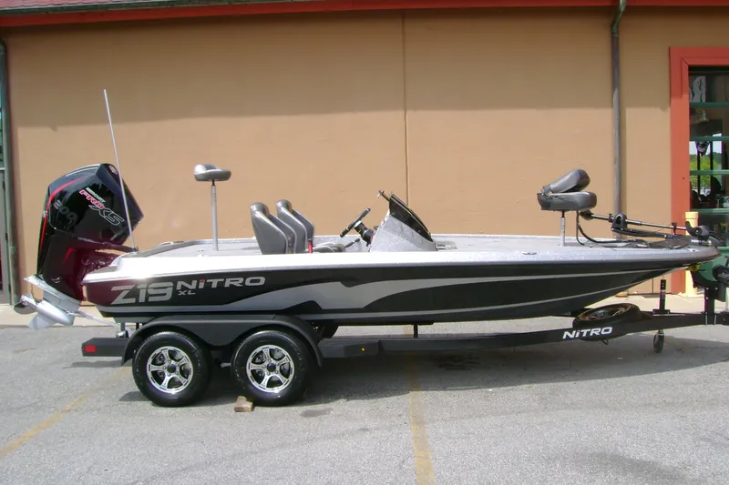 The Image of 2026 Nitro Z19 XL boat on trailer, featuring sleek design and powerful engine. - 0