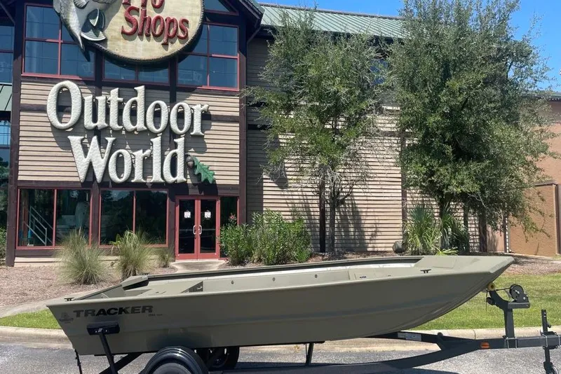The Image of 2026 Tracker Grizzly 1754 Utility boat outside Outdoor World store. - 0