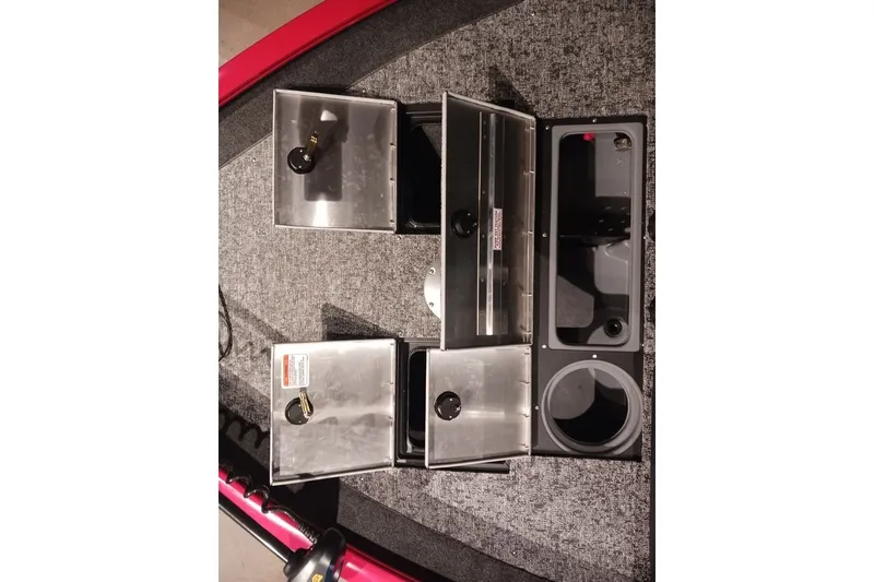 Slide: The Image of Storage compartments of 2026 Tracker Pro Guide V-16 WT boat, open and organized. - 25