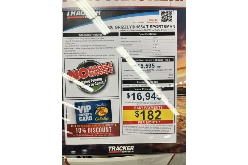 Slide: The Image of 2026 Tracker Grizzly 1654 T Sportsman boat pricing and features display. - 4