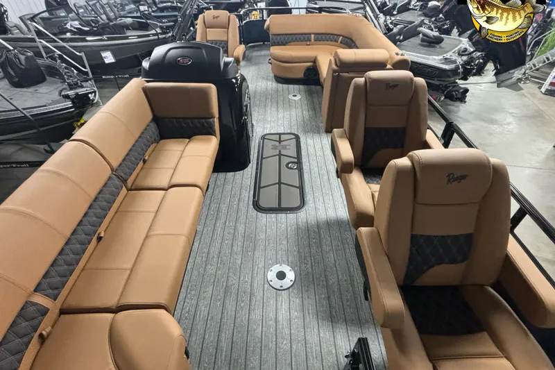Slide: The Image of 2026 Ranger 223FC boat interior with tan seating and modern design. - 6