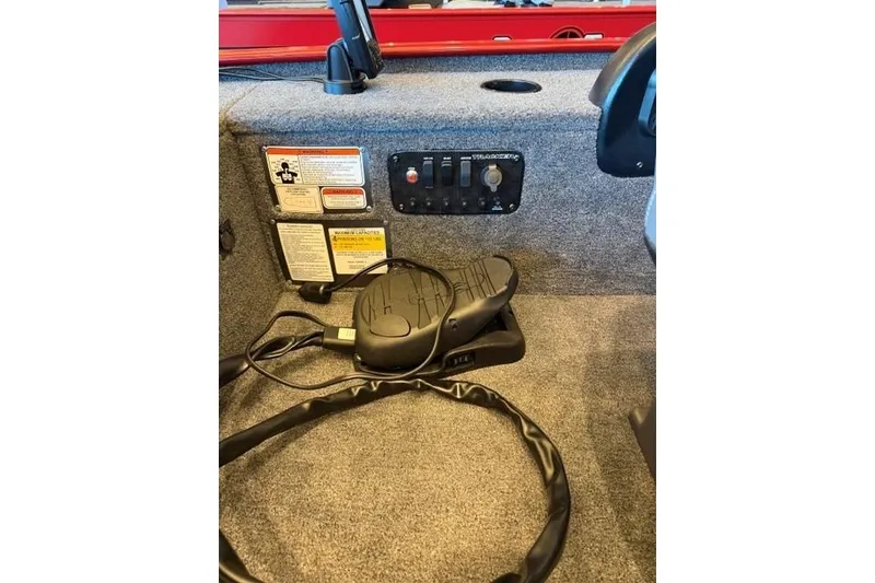 Slide: The Image of Interior of 2026 Tracker Panfish 17 boat with control panel and wiring. - 10
